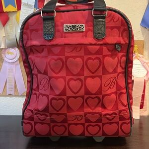 Brighton suitcase carry-on sized. Red heart with black detail.